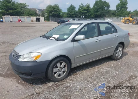 2004 Toyota Corolla Le z USA, uszkodzony, nr VIN 1NXBR38EX4Z238576